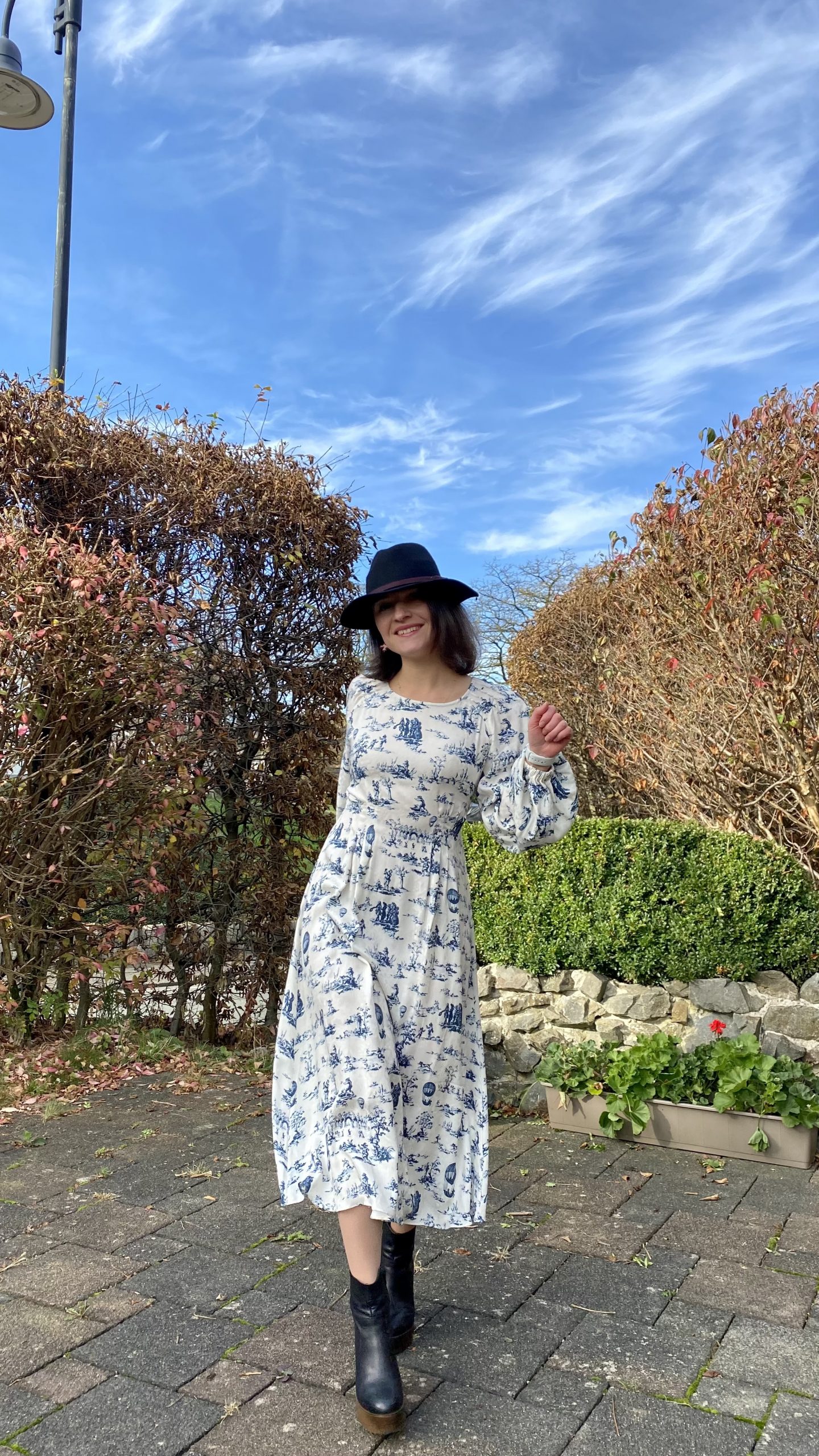 Dress with pleats