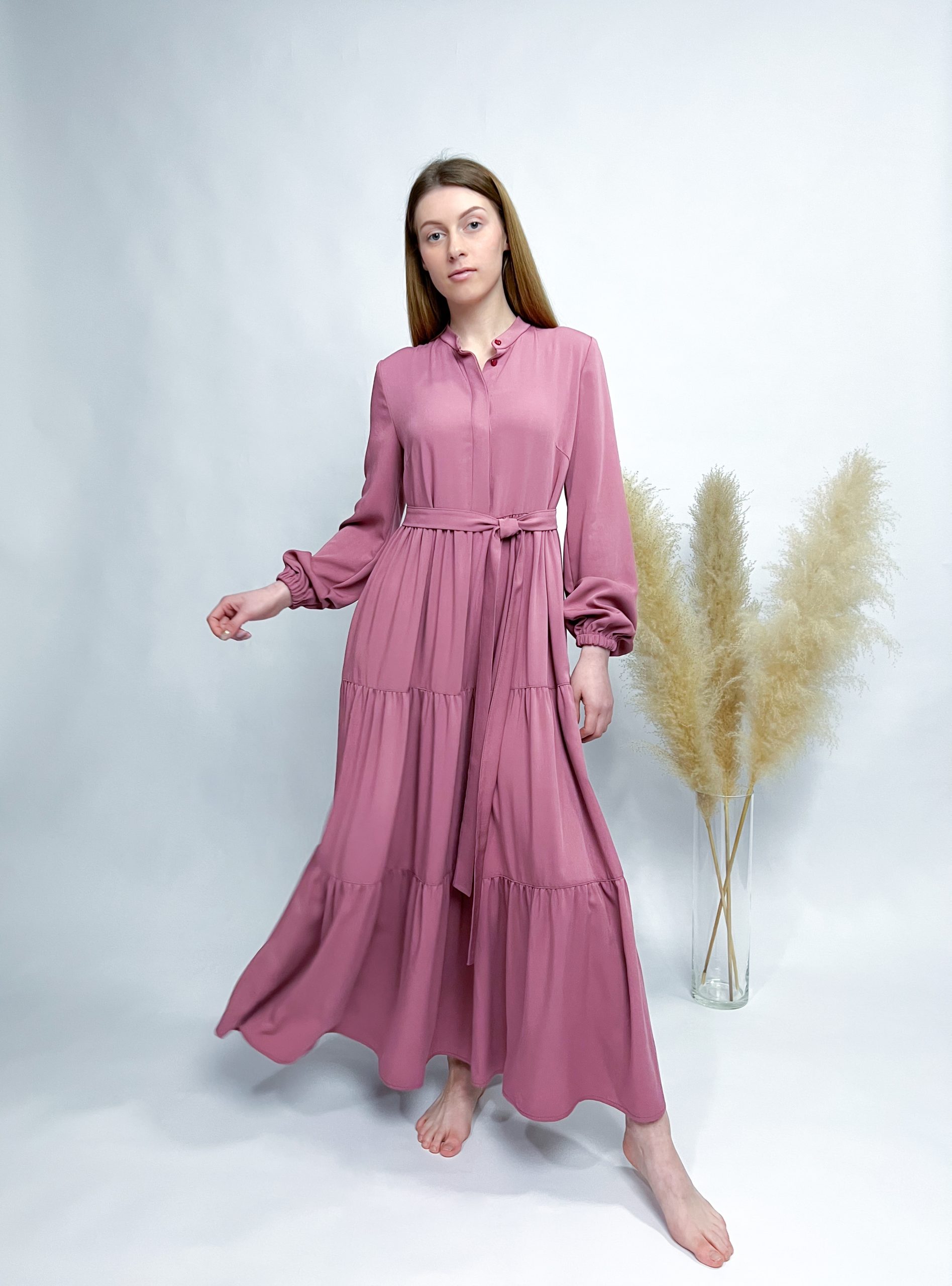 Dress with tiered skirt in one color